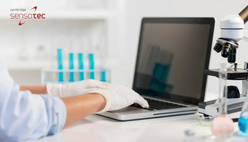Someone with a laptop doing some gas analysis.